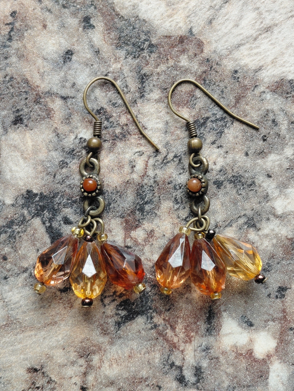 Warm Amber Faceted Glass Beads and Bronze Tone Metal Chandelier Earrings